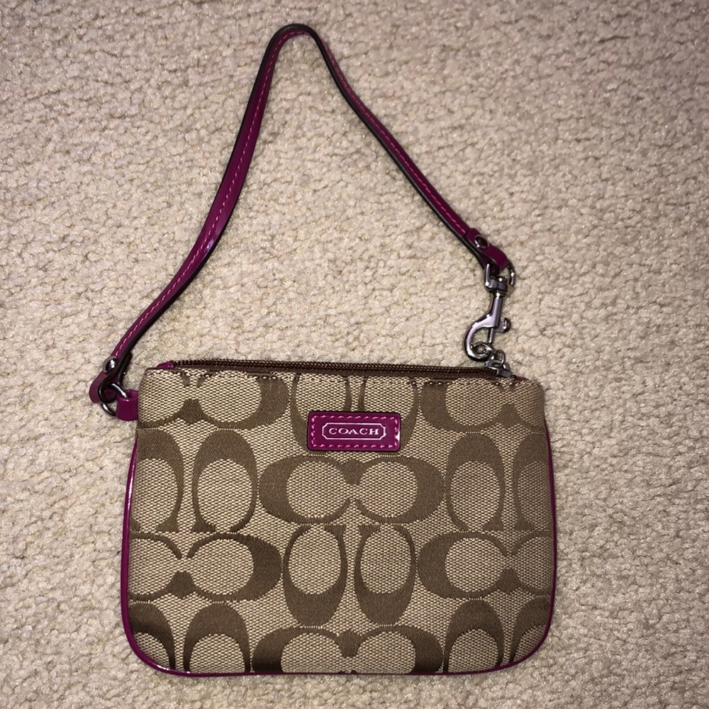 Coach clutch wristlet with purple/magenta trim